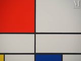 a close up of a painting of a red, yellow, blue and black square