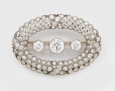 une broche en diamant et en or