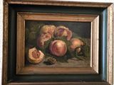 tableau représentant des pêches et d'autres fruits posés sur une table, dans un cadre noir