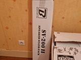 a box and a box of paper sitting on the floor