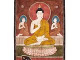 une image représentant un tableau où l'on voit un Bouddha assis sur un lotus