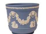 a blue pot with a white design on it
