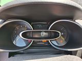 a car dashboard with various gauges and numbers on it