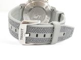 the watch is on a strap with a silver buckle