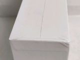 a close up of a white box on a table