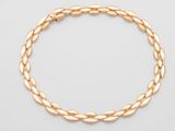 an 18k gold bracelet with twisted links