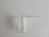 a plastic cup that is sitting on a table