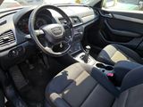 dashboard of a car with black leather seats and steering wheel