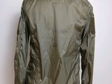 the back of a green jacket on a mannequin mannequin mannequin mannequin mannequin mannequin mannequin mannequin