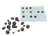 a picture of some buttons on a piece of paper