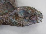 a statue of a turtle that is sitting on a table