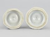 pair of chinese white glazed bowls with raised rims