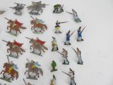 a lot of figurines that are on a table