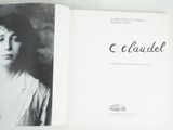 a black and white photo of a woman in a book