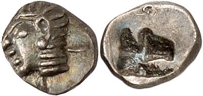 a silver coin with an image of a man and a woman on it