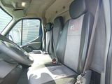 a view of the inside of a truck with the driver ' s seat up