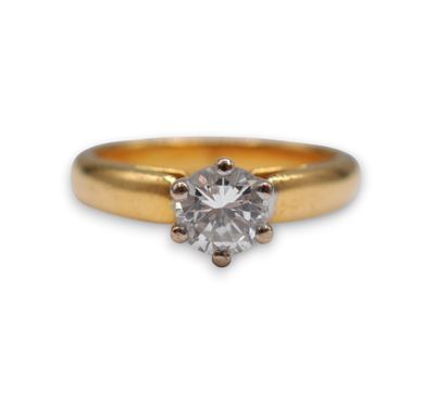 a close up of a diamond ring on a white background