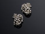 a pair of diamond ear clips, by van cleef
