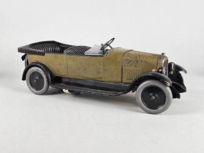 a toy car that is sitting on a white surface