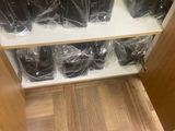 a wooden cabinet with a lot of items inside of it