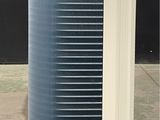 a air conditioner that is sitting on the ground