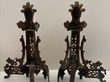 paire de chandeliers anciens en fonte avec motif floral