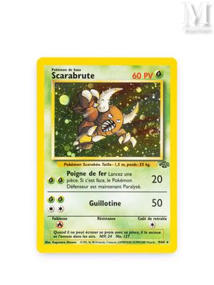 a close up of a pokemon card on a white surface