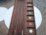 a table that has a bunch of pens on it