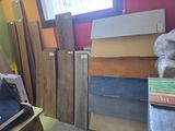a lot of different types of flooring in this room
