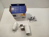 a box of toilet paper and a toilet brush on a table