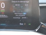 the dashboard of a car with a digital display on the dashboard