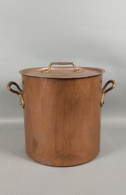 an old copper pot with handles and handles on a white background