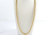 a gold chain necklace on a mannequin mannequin mannequin mannequin mannequin mannequin mannequin mannequin manne