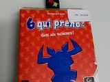 a card game with a picture of a blue bull on it