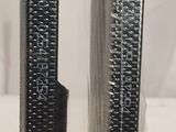 two metal poles that are sitting on a table