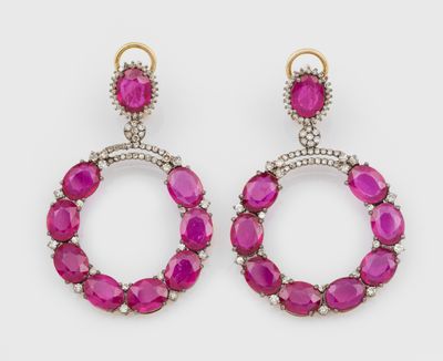 une paire de boucles d'oreilles en rubis et diamants