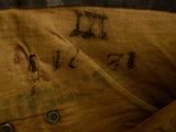 a close up of a brown bag with writing on it