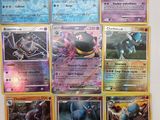 beaucoup de cartes pokemon sur le mur
