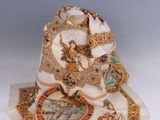 a white hat with a crown on top of it