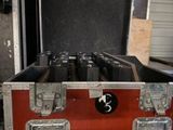 a red case with six bottles of beer inside of it