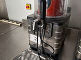 a machine that is sitting on a counter in a kitchen