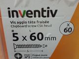 a package of screws in a package on a table