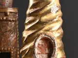 a gold statue of a hand and a gold statue of a hand and a gold statue of a hand and a gold statue of a hand
