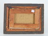 an old picture frame with a piece of wood sticking out of it