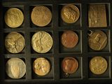 a box with a lot of different coins in it