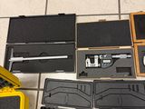 many tools that are sitting on the floor next to each other