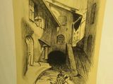 dessin représentant une maison devant laquelle se trouve un chat
