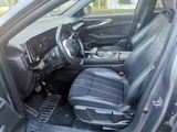 the interior of a car with the front seats folded down
