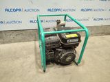an image of a small engine sitting on top of a green cart