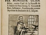 un vieux livre sur lequel figure l'image d'un homme assis sur une chaise